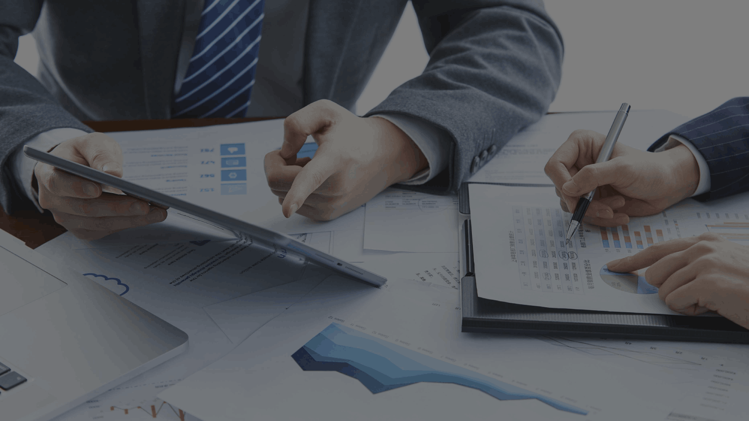 businessman-analyzing-financial-data-with-tablet (4)